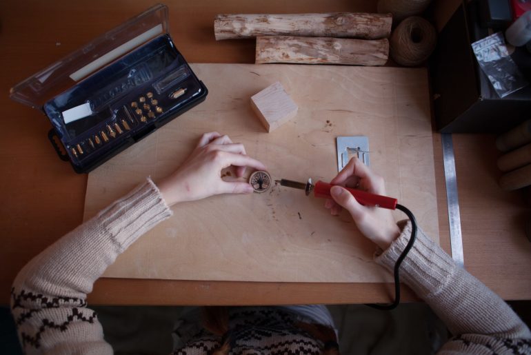 pyrography artist working